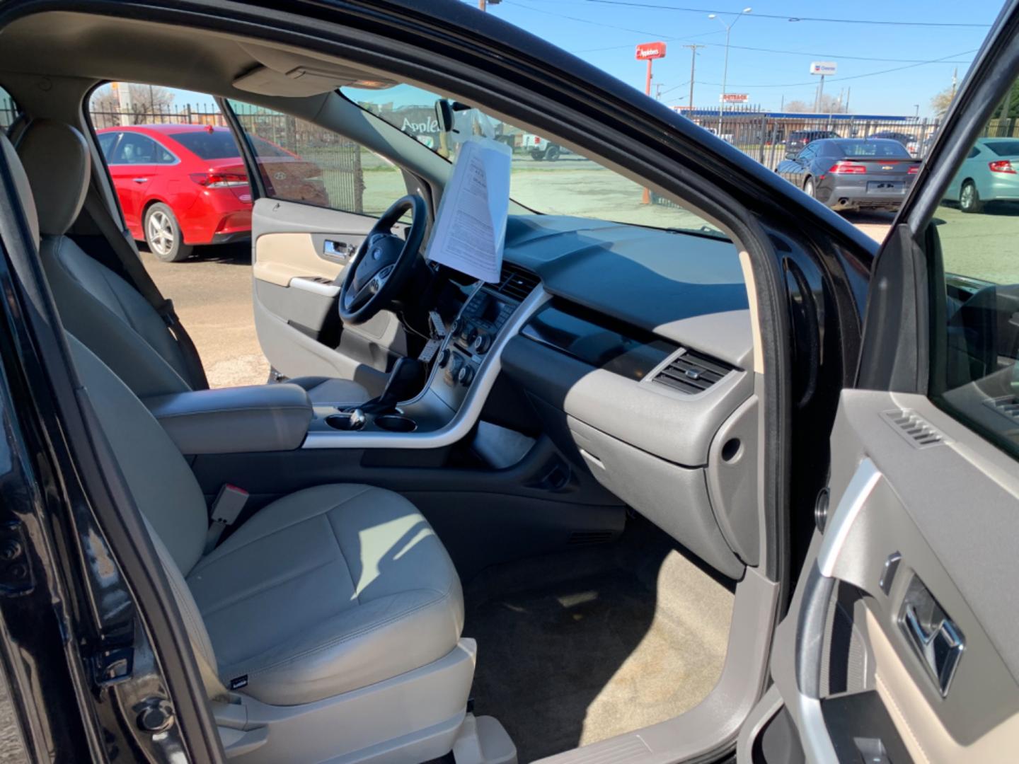 2013 Black /Tan Ford Edge (2FMDK3GC5DB) with an V6 - 3.5L 3496cc 213ci GAS MFI vin C - 4 valve DOHC engine, AUTOMATIC transmission, located at 1830 North Belt Line Road, Irving, TX, 75061, (469) 524-0199, 32.834373, -96.993584 - Photo#12